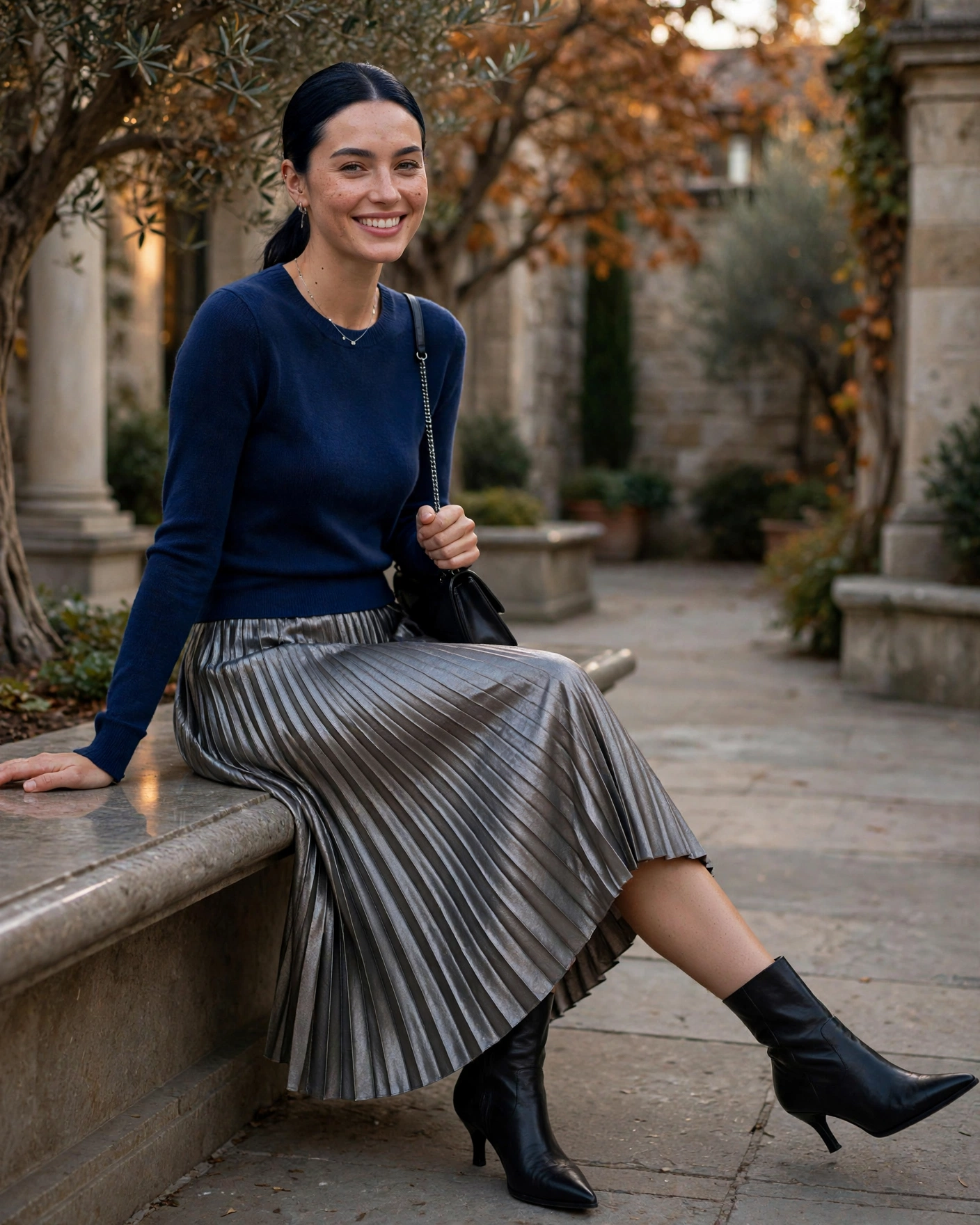 20 Midi Skirt Fall Outfits: Chic and Effortless Looks to Try 13 Pleated Metallic Midi Skirt with a Fine-Knit Top Midi Skirt Fall Outfit
