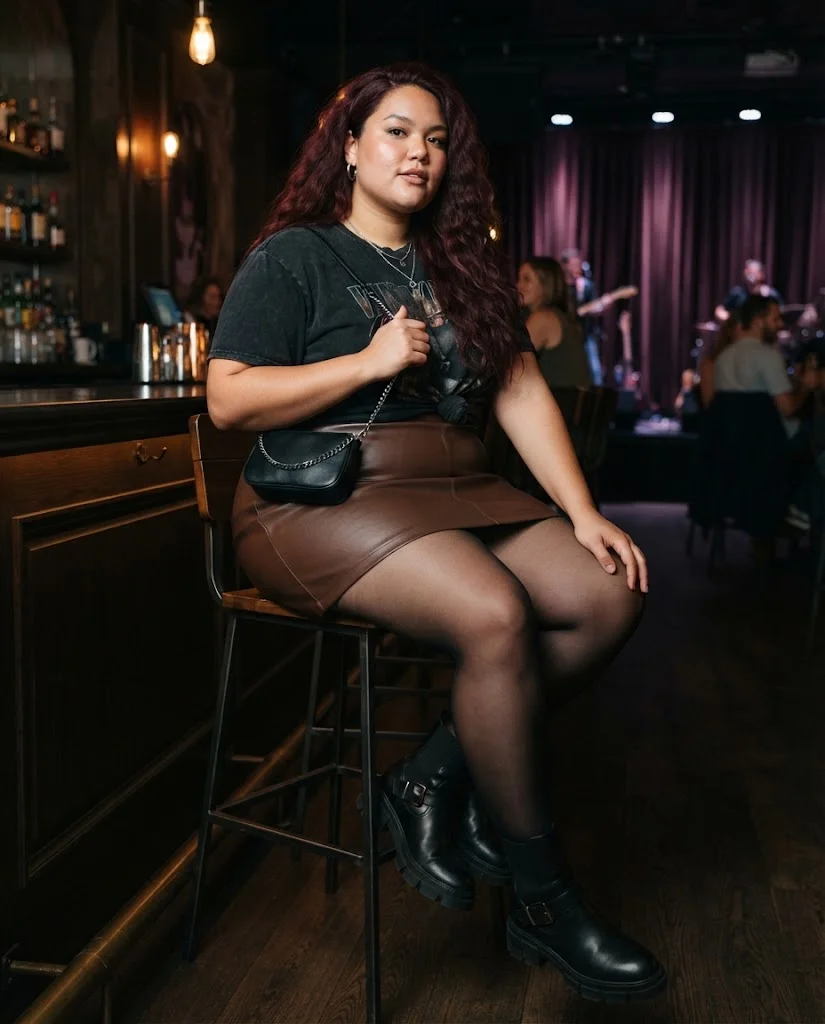 Plus Size Fall Bar Outfits: 20 Chic Looks for Nights Out 9 Chocolate Faux Leather Mini Skirt With a Band Tee and Moto Boots Plus Size Fall Bar Outfit